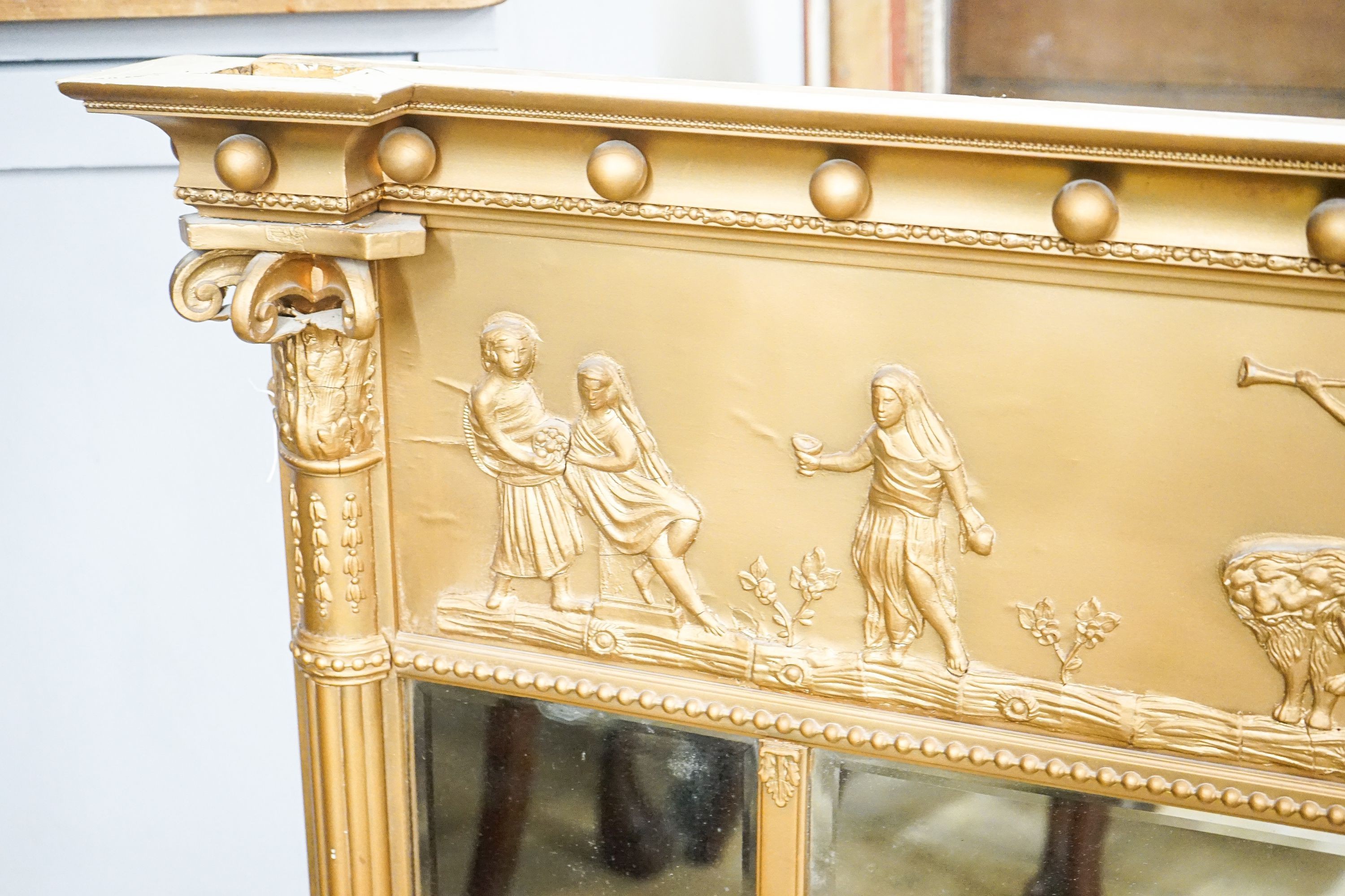 A Regency style giltwood and gesso overmantel mirror, length 140cm, height 88cm